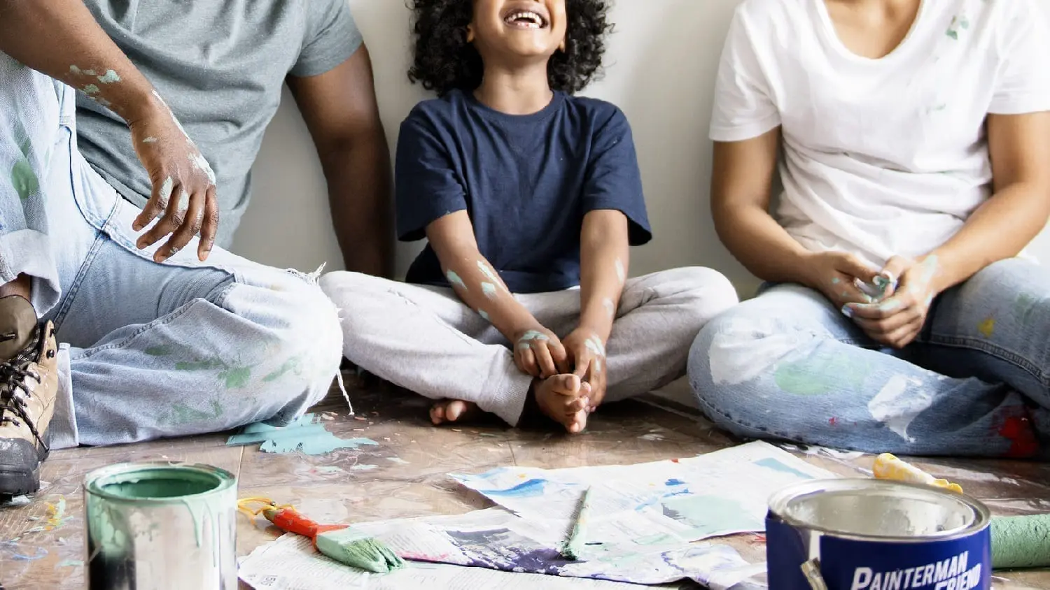 Detail of family resting after painting a wall: Photo 111362157 © Rawpixelimages | Dreamstime.com