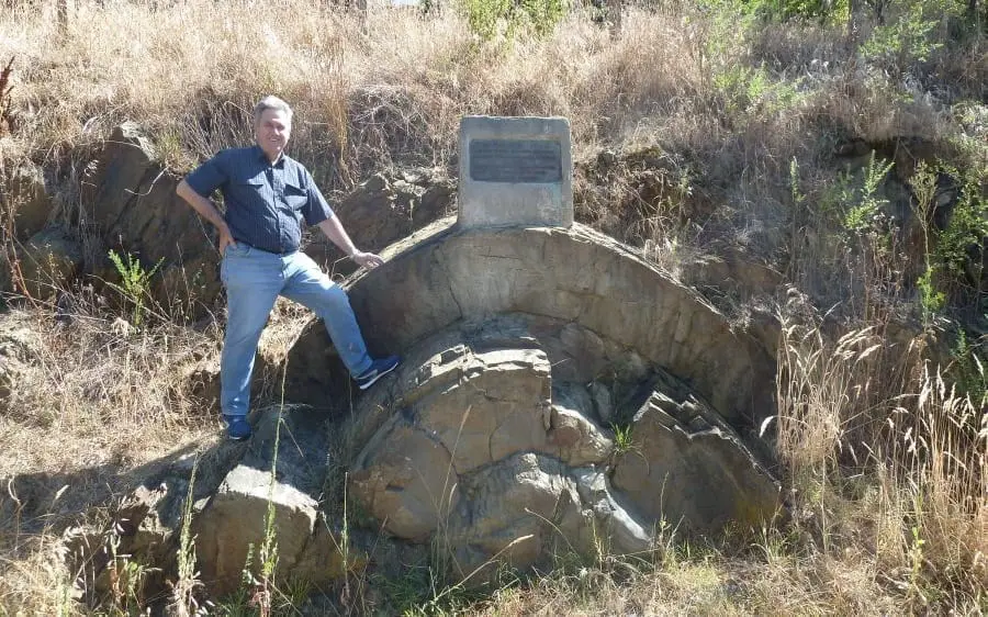 Tas Walker standing next to the anticline the article discusses
