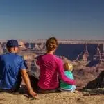 Family facing the Grand Canyon: Photo 111806279 © Anna Dudko | Dreamstime.com