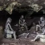 Sculptures of prehistory people in a cave Hunan province, China: Photo 223652929 / Caveman © Matyas Rehak | Dreamstime.com