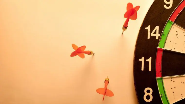 Darts in the wall instead of the target: Photo 30427503 / Missed Target Arrows © Sergii Gnatiuk | Dreamstime.com