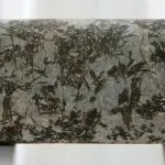 Komatiite rock core with visible dark crystals: Photo 131480592 © Adwo | Dreamstime.com