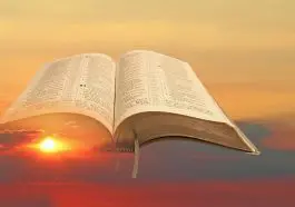 Sunset with an open Bible superimposed over it: Photo 165208206 / Clouds © Photodynamx | Dreamstime.com
