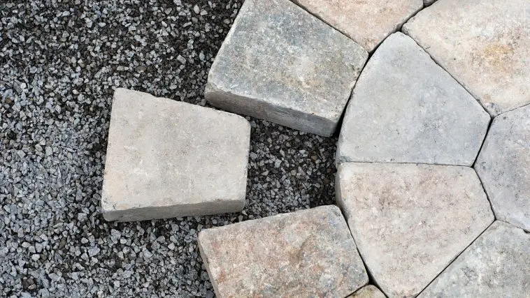 Stone pavers with one ready to set in place: Photo 19004374 © Ulga | Dreamstime.com