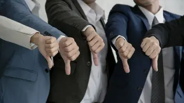 Thumbs down group: Photo 126569240 © Baramee Thaweesombat | Dreamstime.com