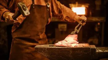 Closeup of a blacksmith working iron on an anvil: Photo 78566283 / Anvil Blacksmith © Nejron | Dreamstime.com