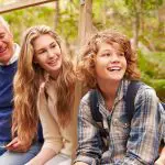 Grandparents and teens sitting outdoors: Photo 59926486 © Monkey Business Images | Dreamstime.com