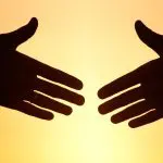 Handshake at sunset: Photo 25727473 © Yanlev | Dreamstime.com