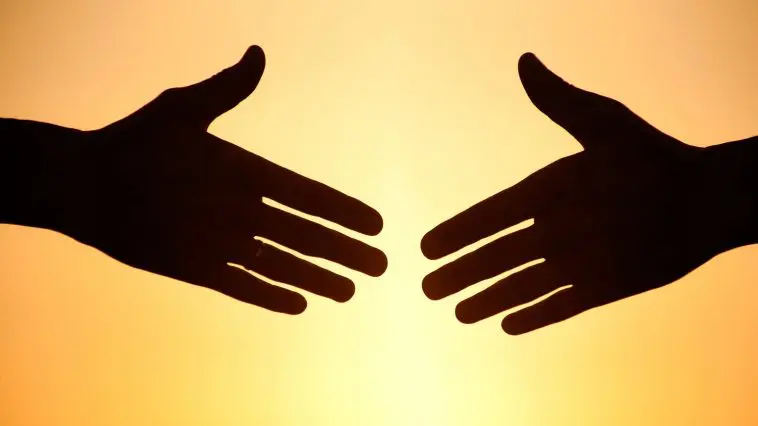 Handshake at sunset: Photo 25727473 © Yanlev | Dreamstime.com