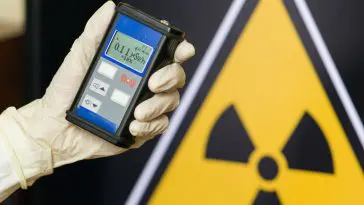 Handheld Geiger counter with radioactive warning sign: Photo 115596517 © Filin174 | Dreamstime.com