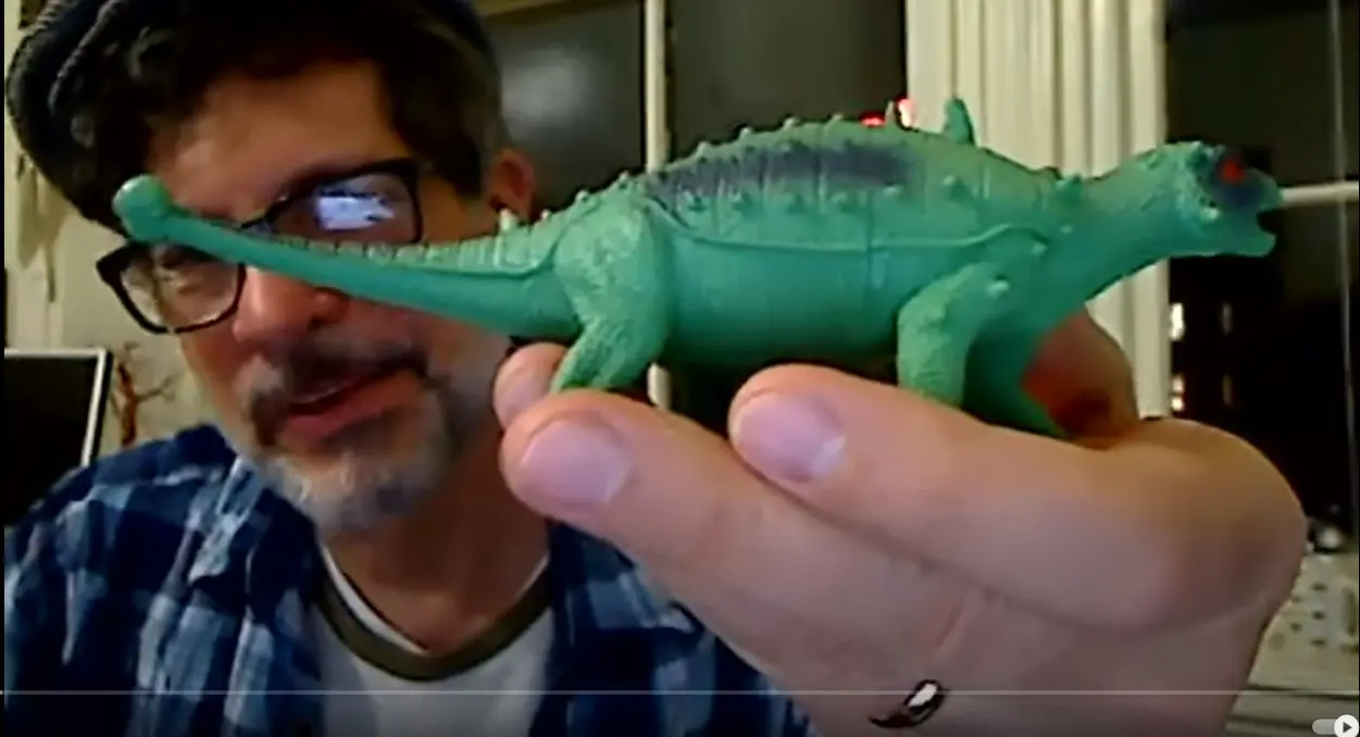 Flood victim dinosaur video still