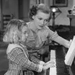 Vintage piano lesson photo: ID 52010989 © Everett Collection Inc. | Dreamstime.com