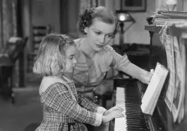 Vintage piano lesson photo: ID 52010989 © Everett Collection Inc. | Dreamstime.com