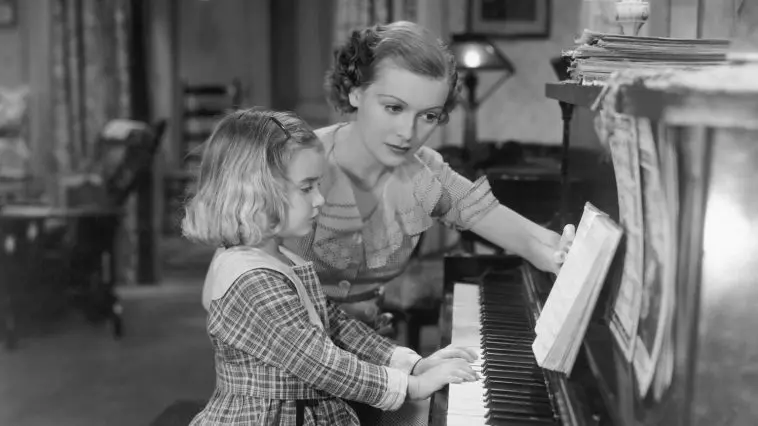 Vintage piano lesson photo: ID 52010989 © Everett Collection Inc. | Dreamstime.com