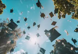 Graduation Mortars tossed into the air with trees in the background: ID 307977285 | Graduation Hats © Vitaliy Nykolyshyn | Dreamstime.com