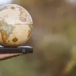 Globe on a Bible: ID 161769582 | Bible Globe © Wirestock | Dreamstime.com