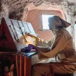 Figure of a monk copying in a cave monastery: ID 365170416 © Agustín Orduña Castillo | Dreamstime.com