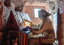 Figure of a monk copying in a cave monastery: ID 365170416 © Agustín Orduña Castillo | Dreamstime.com