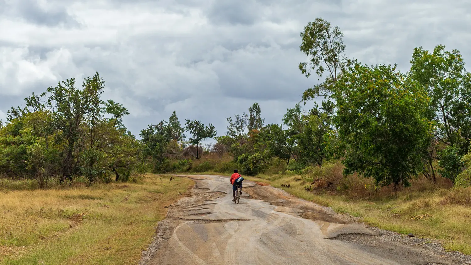 Bike path with potholes, Madagascar: ID 182947246 © Christian Offenberg | Dreamstime.com