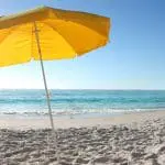 Beach with a sun umbrella: ID 7557973 | Beach Sun Umbrella © Bowie15 | Dreamstime.com