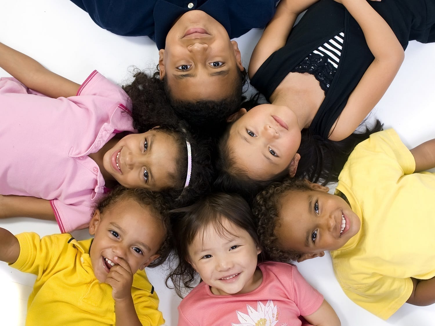 Children of different ethnic backgrounds forming a star shape: ID 4159688 © Thomas Perkins | Dreamstime.com