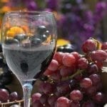 Wine glass with grapes