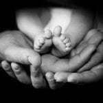 Baby feet cradled in parents' hands: ID 41326530 © Coreen Bester | Dreamstime.com