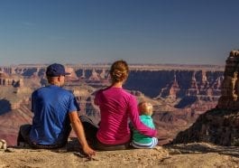 Family facing the Grand Canyon: Photo 111806279 © Anna Dudko | Dreamstime.com