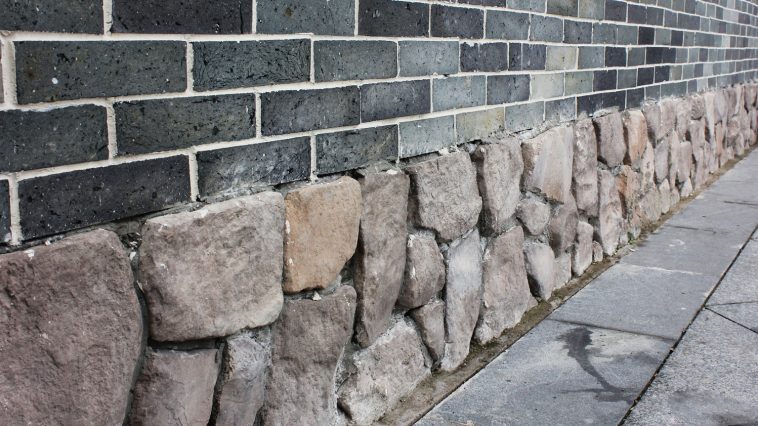 Stone foundation with bricks above: Photo 30991936 © Happyboy2003 | Dreamstime.com