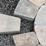 Stone pavers with one ready to set in place: Photo 19004374 © Ulga | Dreamstime.com