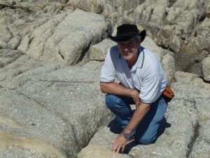 Tas Walker photo examining rock formation