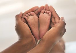 Baby feet with mother's hands: Photo 241438507 © Yuri Arcurs | Dreamstime.com